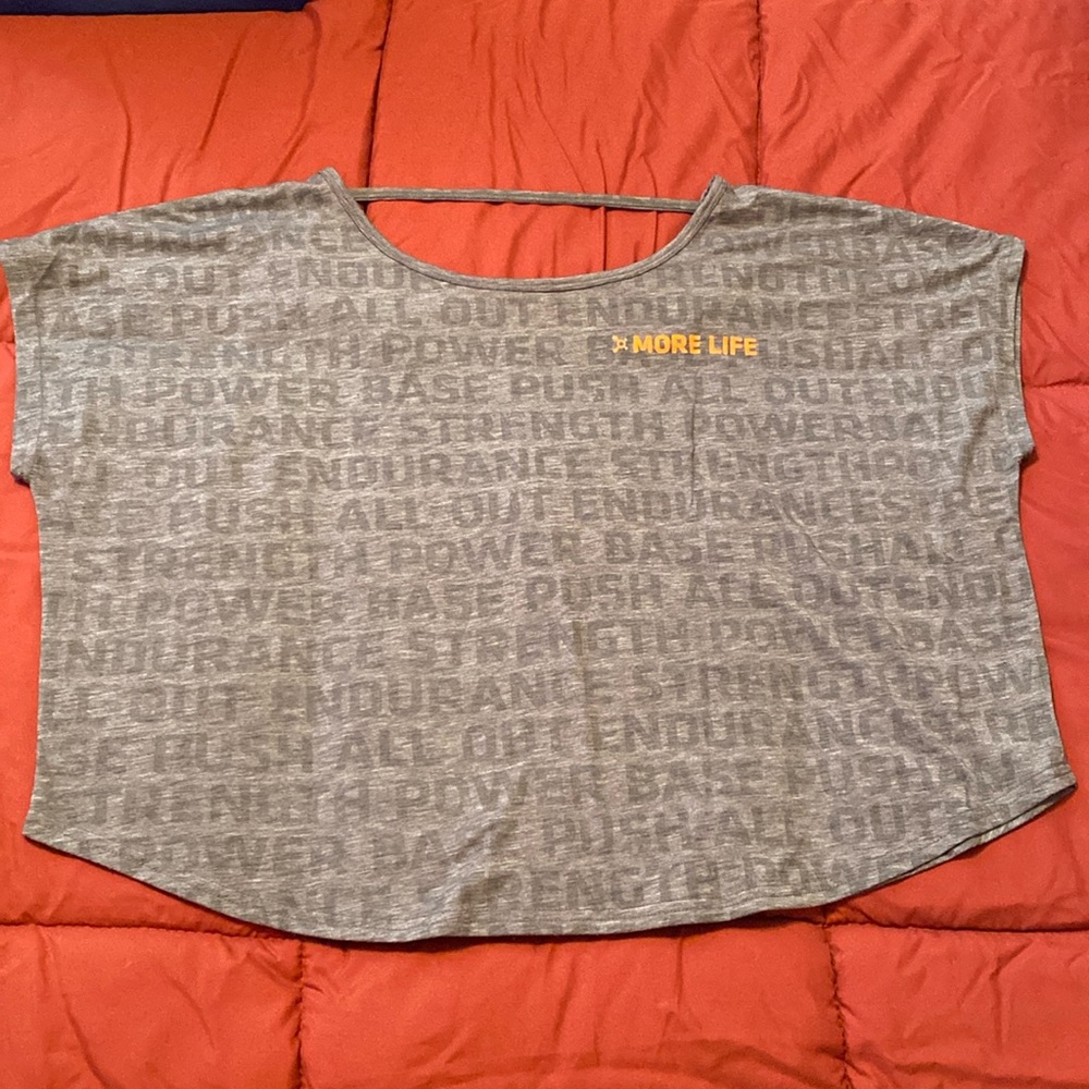 Grey Orange Theory Shirt with writing